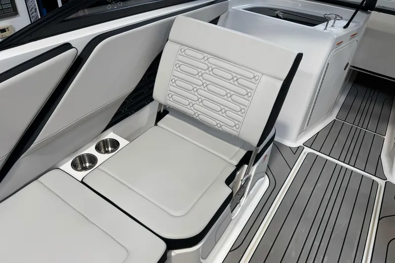 Slide: The Image of 2026 Sea Ray SPX 210 boat interior with sleek seating and modern design. - 19