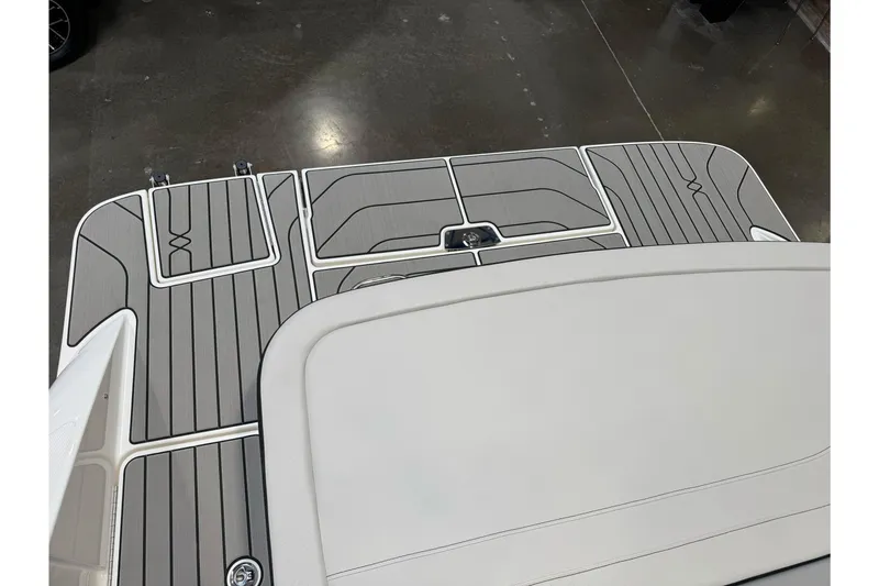 Slide: The Image of 2026 Sea Ray SPX 210 boat deck with sleek, modern design and gray detailing. - 7