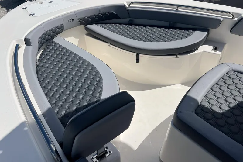 Slide: The Image of 2026 Defiance Catalina 210 boat interior with cushioned seating and modern design. - 20