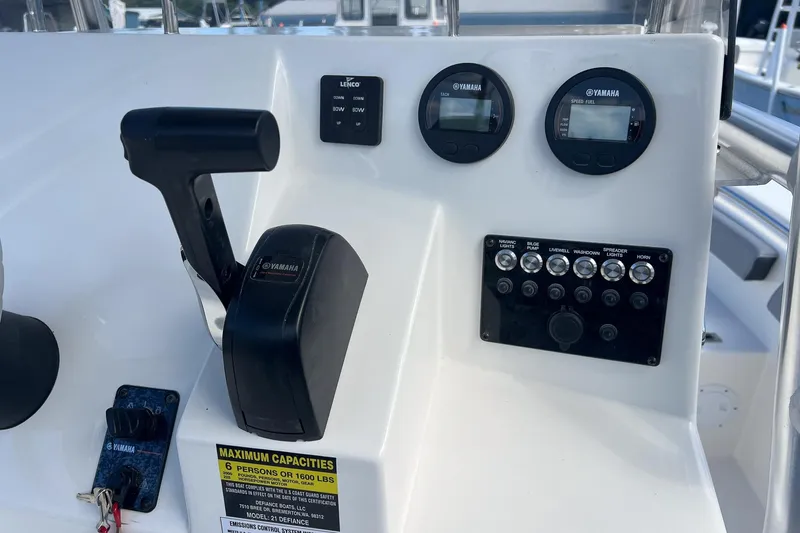 Slide: The Image of Control panel of 2026 Defiance Catalina 210 boat with Yamaha gauges and switches. - 8