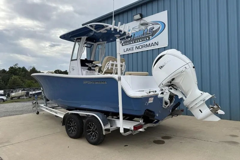 Slide: The Image of 2026 Sportsman Open 212 Center Console boat on trailer at Lake Norman dealership. - 3