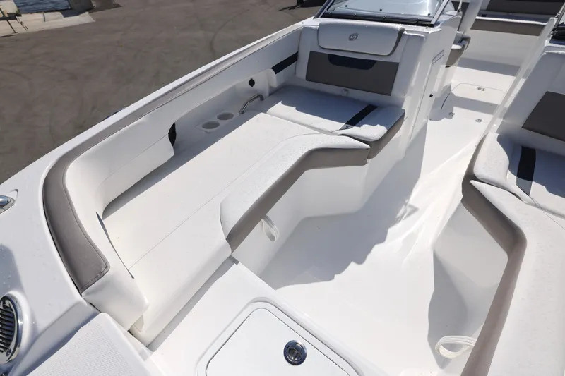 Slide: The Image of 2026 Hurricane SunDeck 235 OB boat interior with steering console and seating. - 15
