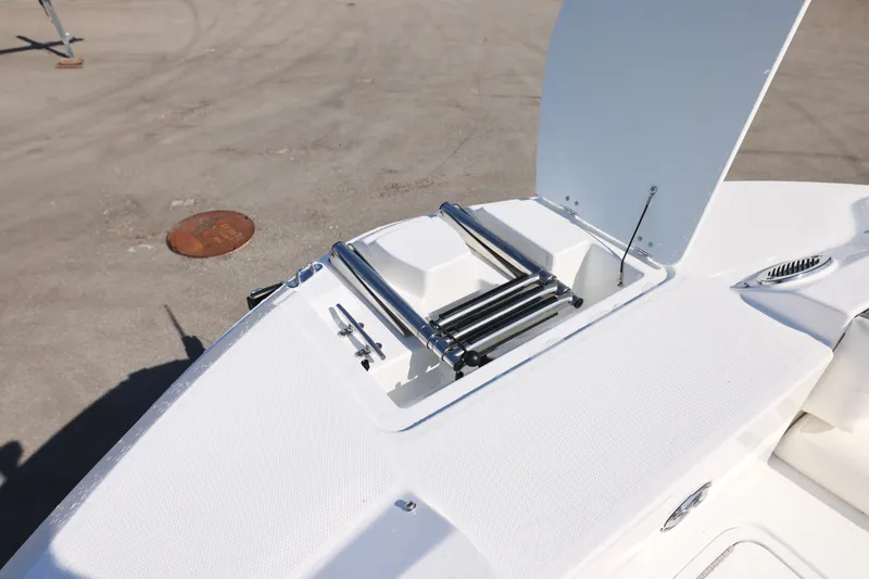 Slide: The Image of 2026 Hurricane SunDeck 235 OB boat interior with sleek seating and modern design. - 16