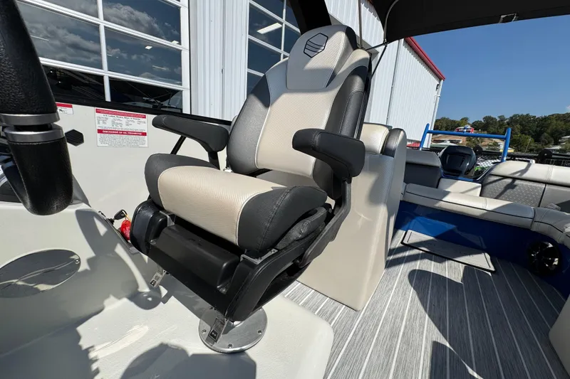 Slide: The Image of Captain's chair on 2022 South Bay 25 Sport CR9-DC boat, featuring modern design and comfort. - 14