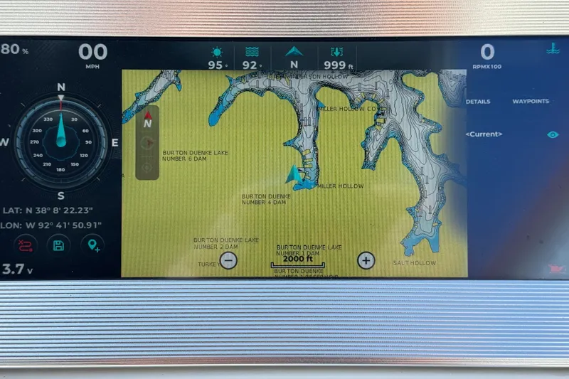 Slide: The Image of Navigation display on a 2022 South Bay 25 Sport CR9-DC, showing a detailed lake map. - 18