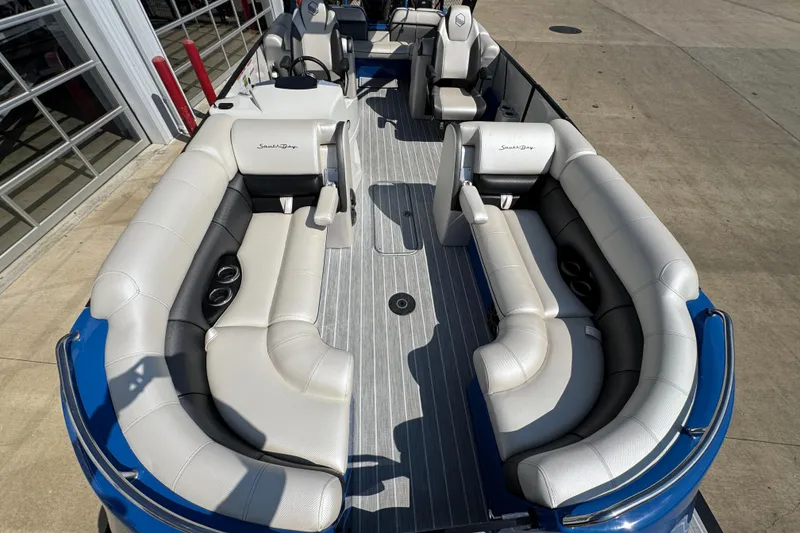 Slide: The Image of 2022 South Bay 25 Sport CR9-DC pontoon boat with luxurious seating and modern design. - 19