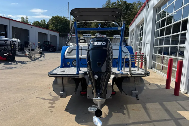 Slide: The Image of 2022 South Bay 25 Sport CR9-DC boat with powerful 350 engine, parked outdoors. - 6