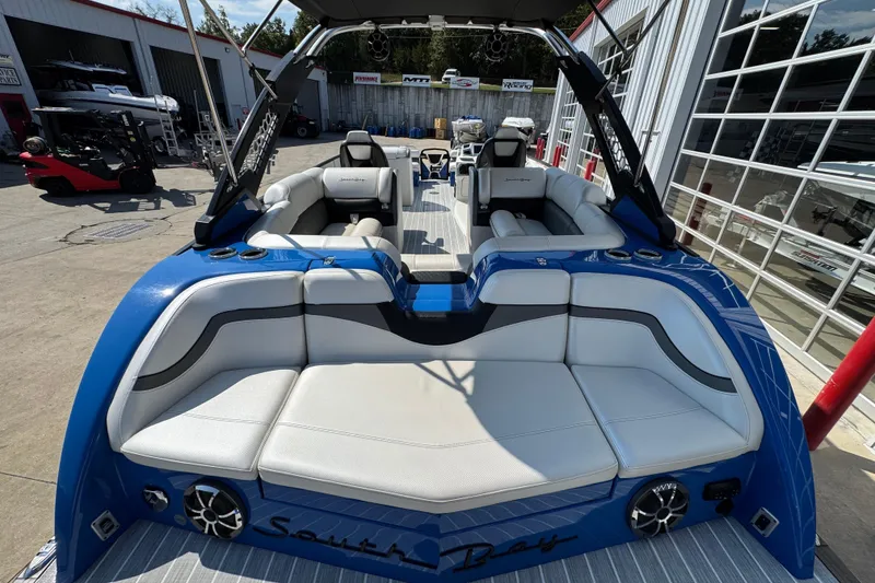 Slide: The Image of 2022 South Bay 25 Sport CR9-DC boat with luxurious seating and modern design. - 7