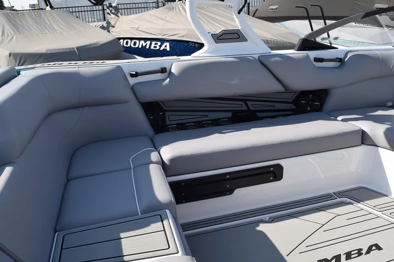 Slide: The Image of 2026 Moomba Max boat interior with gray seating and modern design. - 7