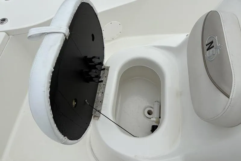 Slide: The Image of 2015 NauticStar 1910 NauticBay boat seat with open storage compartment. - 20