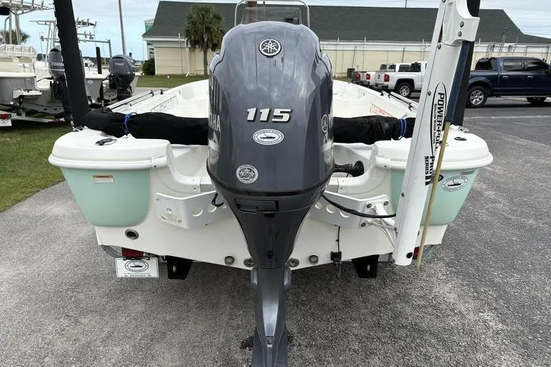 Slide: The Image of 2015 NauticStar 1910 NauticBay boat with Yamaha 115 engine, rear view. - 6