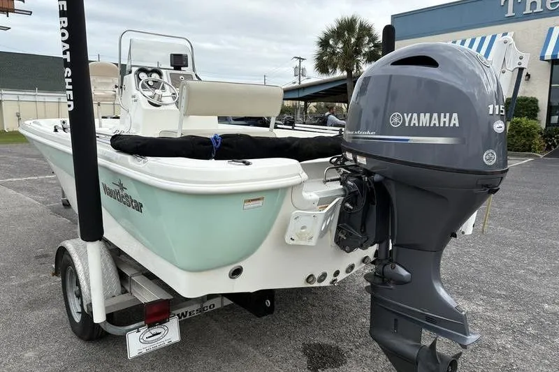 Slide: The Image of 2015 NauticStar 1910 NauticBay boat with Yamaha 115 outboard motor on trailer. - 9