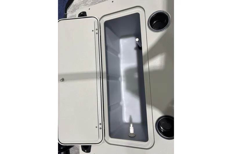 Slide: The Image of Open storage compartment on 2026 Sylvan Mirage X X3 Party Fish boat. - 22