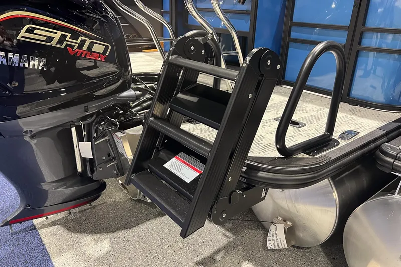 Slide: The Image of 2026 Sylvan Mirage X X3 Party Fish boat with Yamaha SHO VMAX engine and boarding ladder. - 4