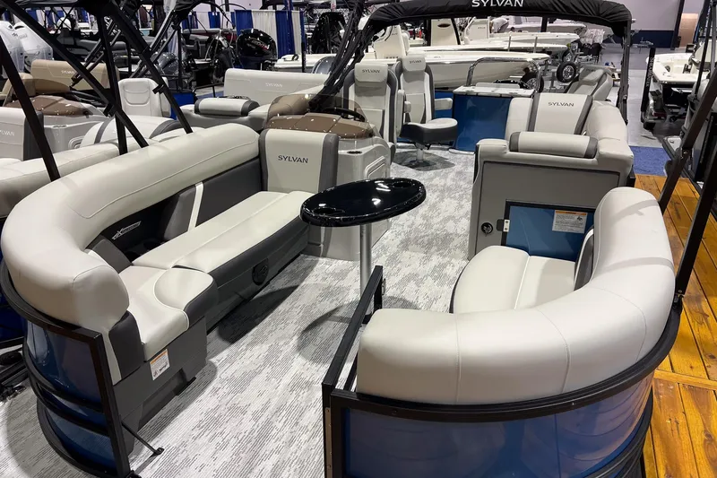 Slide: The Image of 2026 Sylvan Mirage X X3 Party Fish pontoon boat with spacious seating and modern design. - 6