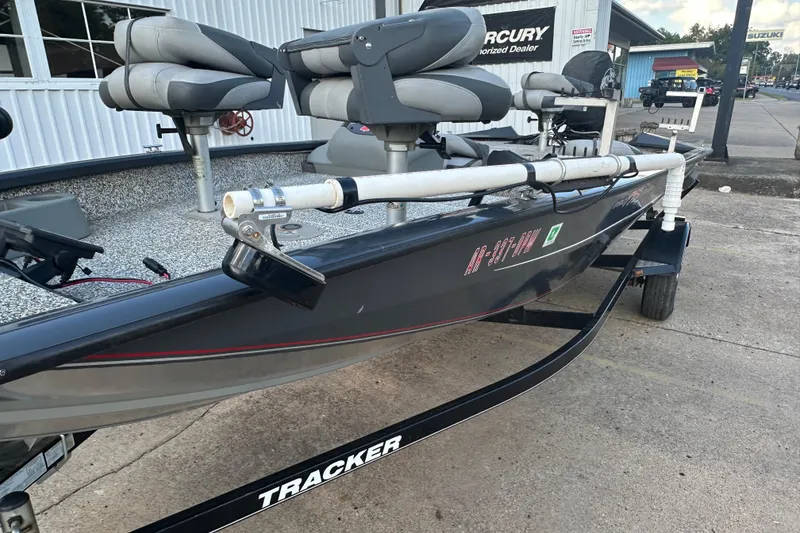 Slide: The Image of 2014 Tracker Pro Team 175 TF fishing boat on trailer, parked outside dealership. - 10