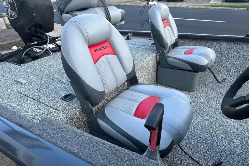 Slide: The Image of 2014 Tracker Pro Team 175 TF boat seats with gray and red upholstery. - 20