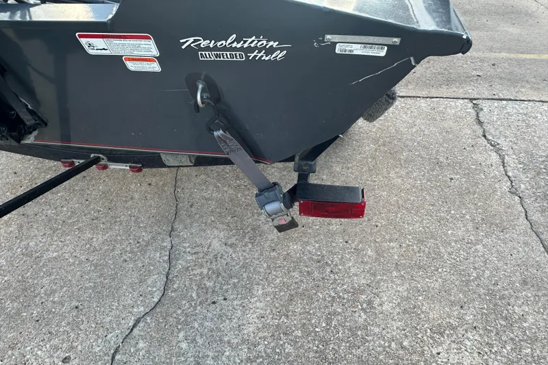 Slide: The Image of 2014 Tracker Pro Team 175 TF boat with Revolution All-Welded Hull on concrete surface. - 21