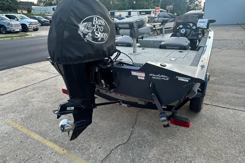 Slide: The Image of 2014 Tracker Pro Team 175 TF boat with Bass Pro Shops motor cover. - 4