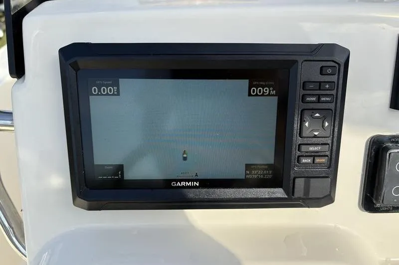 Slide: The Image of Garmin navigation display on 2026 Scout 188 Sportfish boat dashboard. - 17