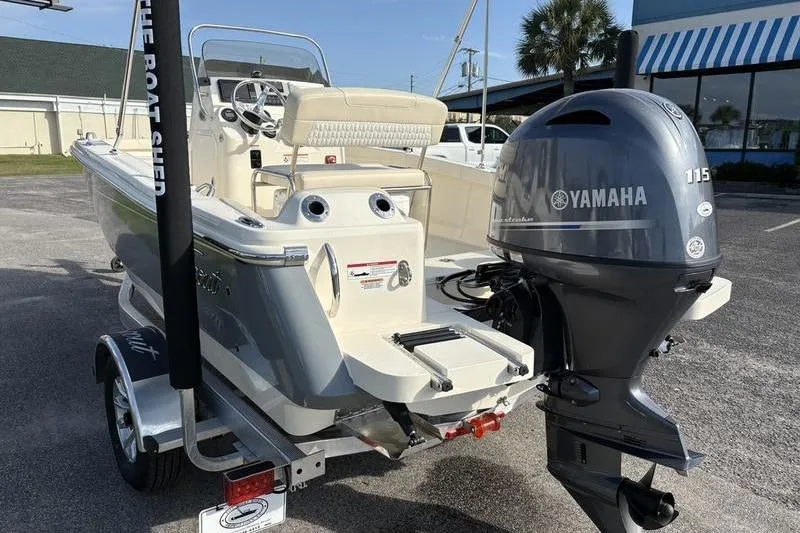 Slide: The Image of 2026 Scout 188 Sportfish boat with Yamaha 115 engine on trailer. - 4