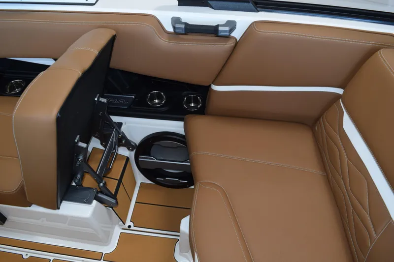 Slide: The Image of 2025 Supra SL interior with tan leather seats and modern design elements. - 13