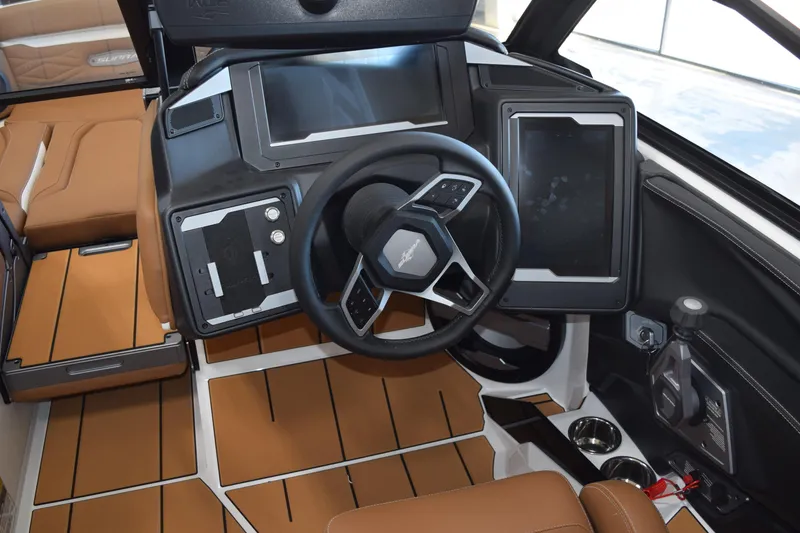 Slide: The Image of 2025 Supra SL boat interior with modern dashboard and steering wheel design. - 5