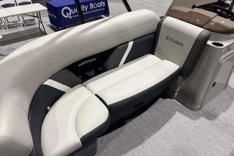 Slide: The Image of 2025 Sylvan Mirage X X3 CLZ boat interior with stylish seating and modern design. - 19