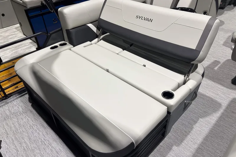 Slide: The Image of 2025 Sylvan Mirage X X3 CLZ boat seating with cup holders, showcasing luxury and comfort. - 23