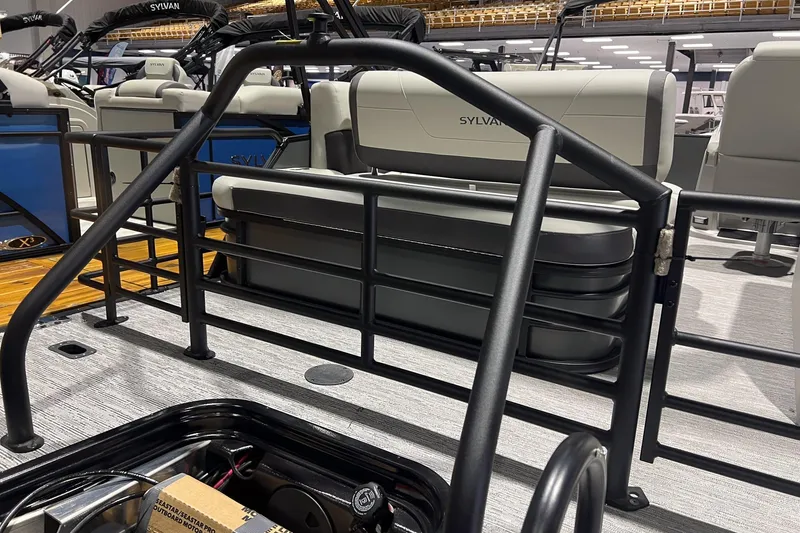 Slide: The Image of 2025 Sylvan Mirage X X3 CLZ pontoon boat interior with seating and railing. - 6