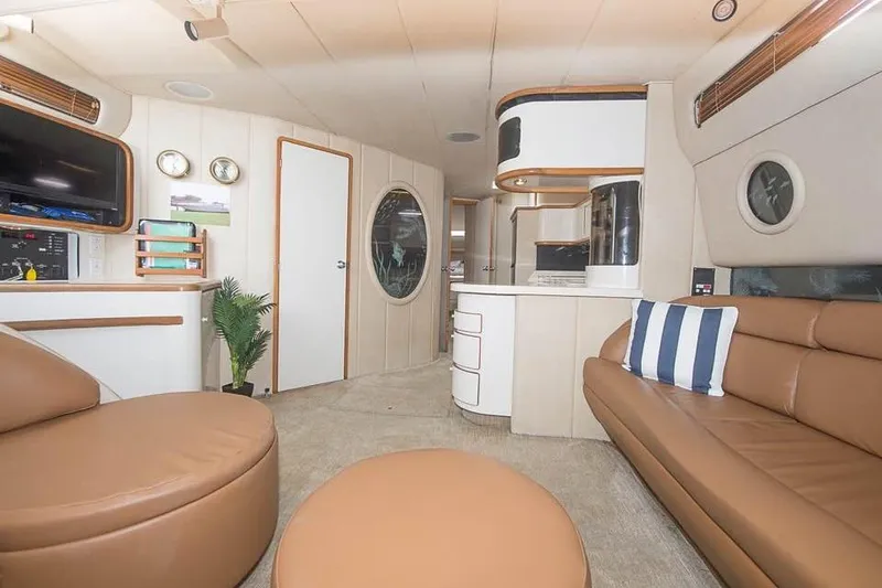 Slide: The Image of Luxurious interior of 1998 Sea Ray 500 Sundancer yacht with modern furnishings. - 13