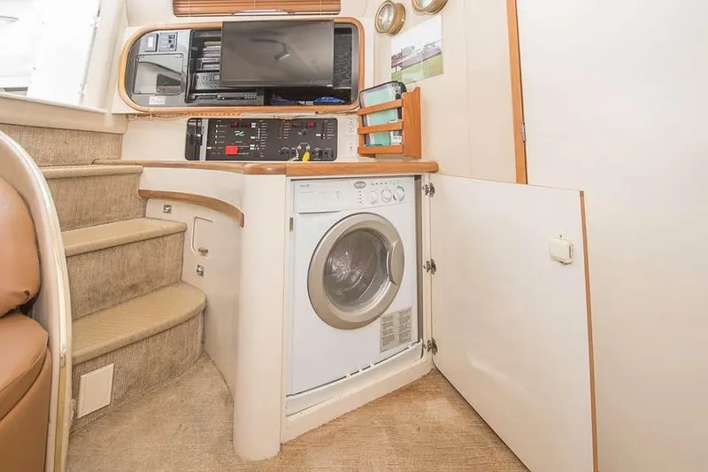 Slide: The Image of Interior of 1998 Sea Ray 500 Sundancer with washer and control panel. - 14