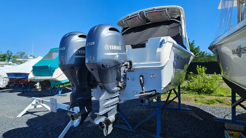Slide: The Image of 2019 Sailfish 275 DC boat with dual Yamaha outboard engines on display. - 9