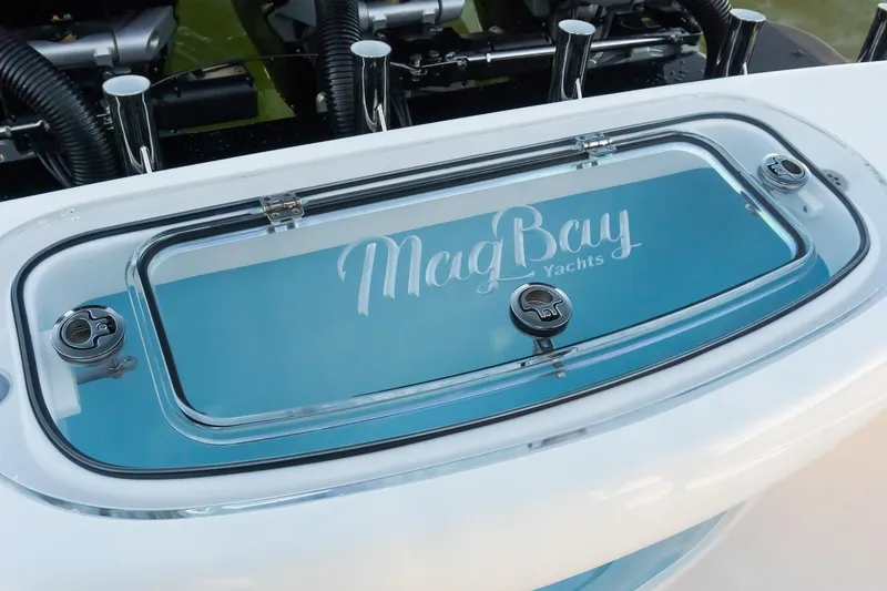 Slide: The Image of 2026 Mag Bay 43 CC yacht detail with logo on hatch cover. - 15