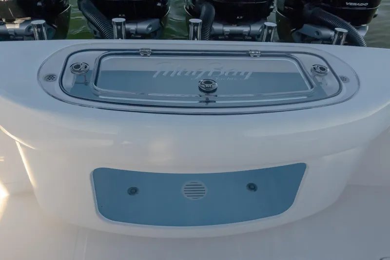 Slide: The Image of 2026 Mag Bay 43 CC boat with sleek design and powerful engines. - 16