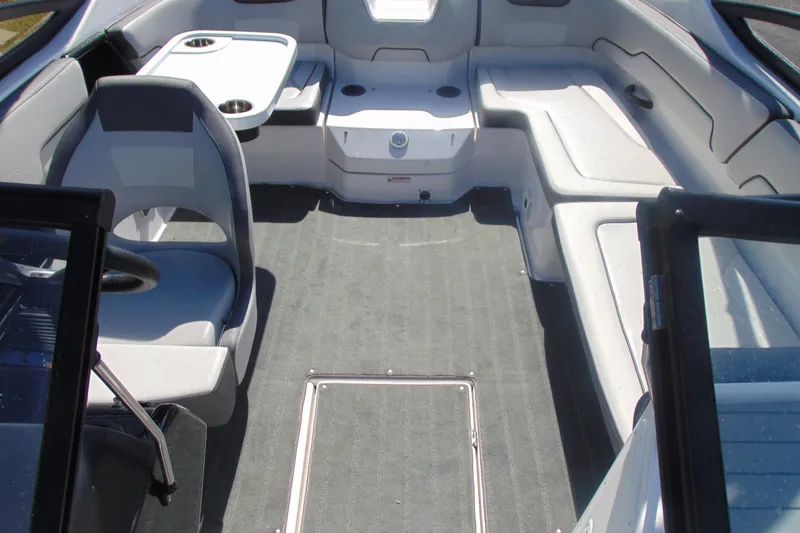 Slide: The Image of 2023 Yamaha Boats AR190 interior with seating and steering wheel. - 12