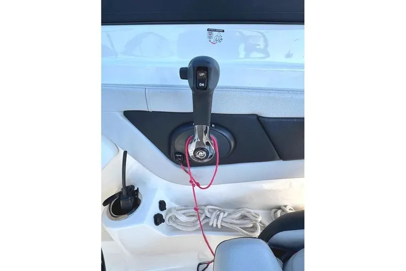Slide: The Image of Throttle control of 2021 Sea Ray SPX 210 Outboard boat with safety lanyard and rope. - 11