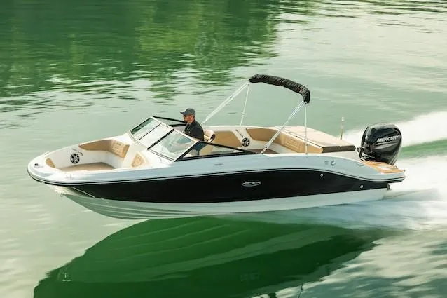 Slide: The Image of Manufacturer Provided Image: 2021 Sea Ray SPX 210 OB boat cruising on a calm lake. - 20