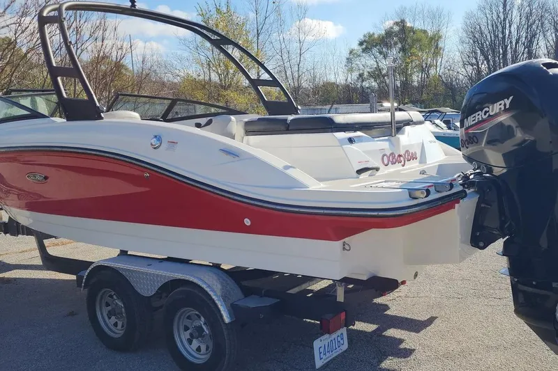 Slide: The Image of 2021 Sea Ray SPX 210 Outboard boat with Mercury engine on trailer. - 30