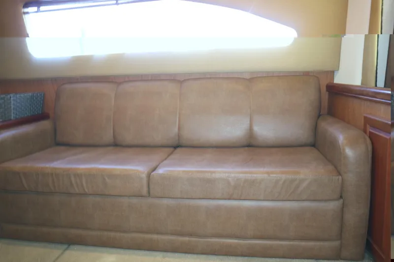 Slide: The Image of Brown leather sofa inside 2005 Luhrs 38 Convertible boat cabin. - 20
