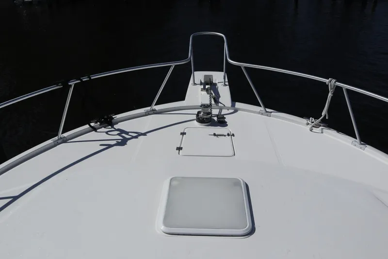Slide: The Image of Bow view of 2005 Luhrs 38 Convertible boat with railing and anchor system. - 57
