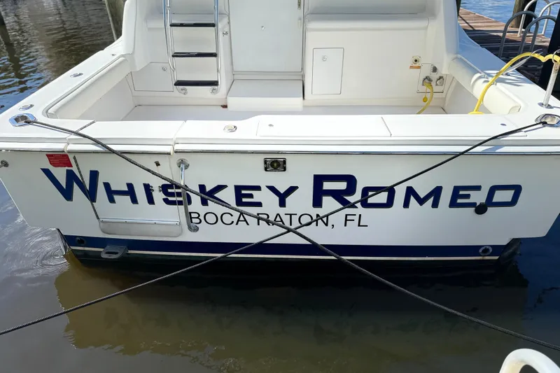 Slide: The Image of 2005 Luhrs 38 Convertible boat named "Whiskey Romeo" docked in Boca Raton, FL. - 9