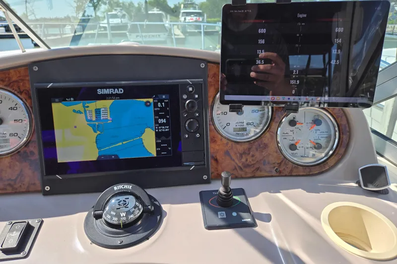 Slide: The Image of Engine compartment of a 2006 Rinker 360 Express Cruiser with twin MerCruiser 496 MAG engines. - 12