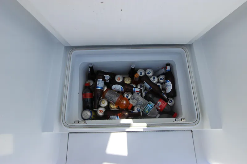 Slide: The Image of Cooler filled with assorted drinks on a 2004 Hatteras 60 Convertible yacht. - 19