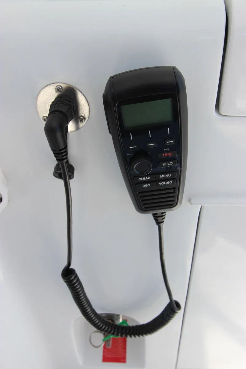 Slide: The Image of Marine radio handset on a 2004 Hatteras 60 Convertible yacht. - 45