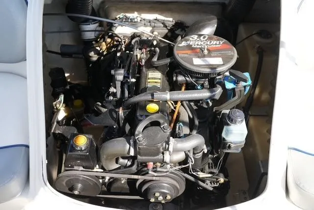 Slide: The Image of 2008 Sea Ray 175 Sport engine compartment with 3.0L Mercury Marine engine. - 14