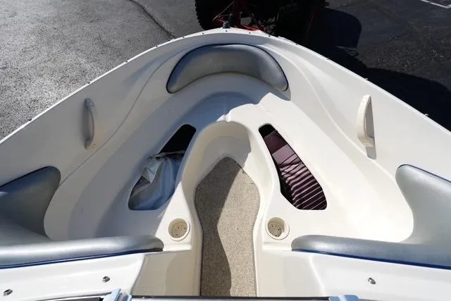 Slide: The Image of 2008 Sea Ray 175 Sport boat interior with seating and storage compartments. - 7