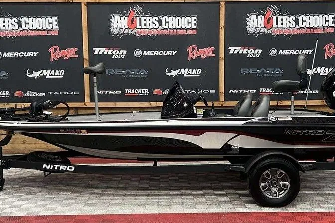 The Image of 2021 Nitro Z17 boat displayed at Angler's Choice event with branded backdrop. - 0