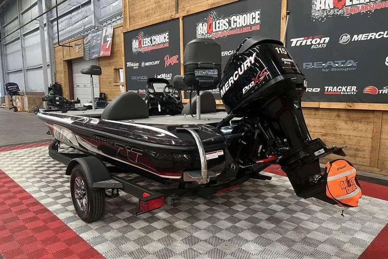 Slide: The Image of 2021 Nitro Z17 boat with Mercury Pro XS engine displayed indoors. - 4