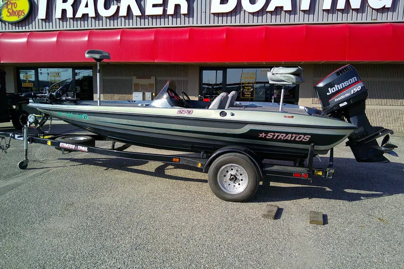 Slide: The Image of 1998 Stratos 273 V boat with Johnson 150 engine at Tracker Boating store. - 15
